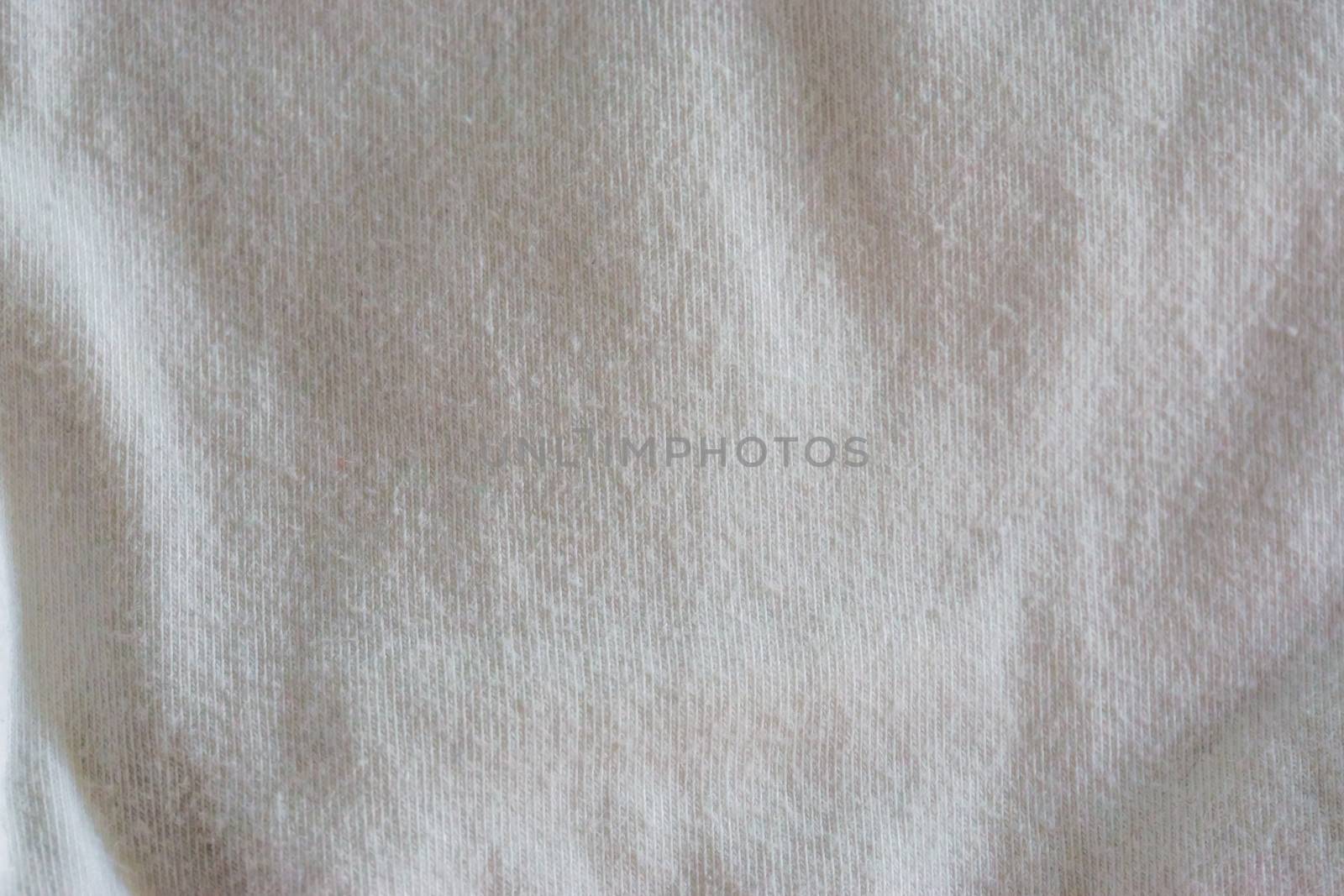macro closeup of a pure white clean cotton fabric, popular material for clothing by charlottebleijenberg