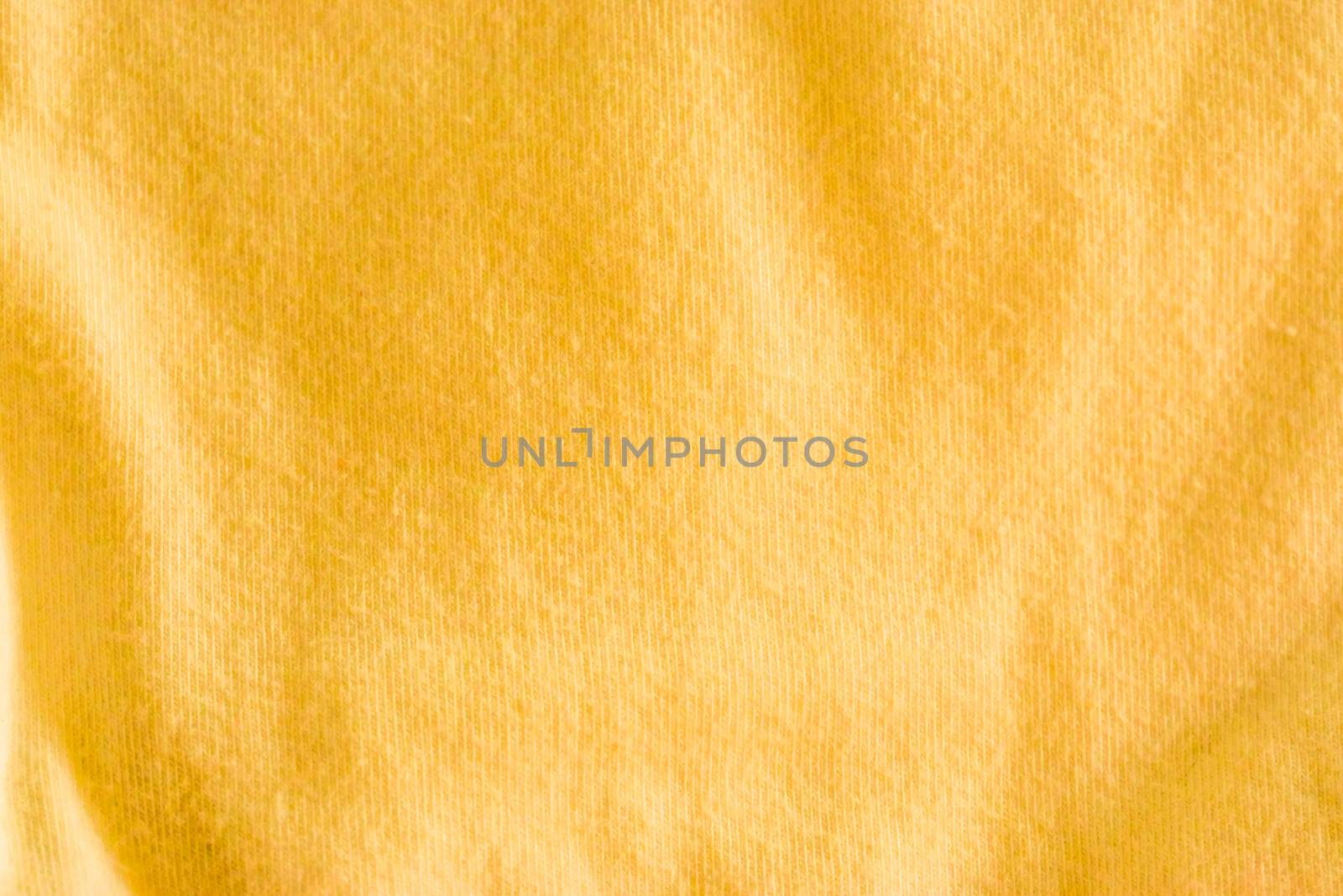 Modern neon yellow cotton fabric in macro closeup, popular material for clothes by charlottebleijenberg