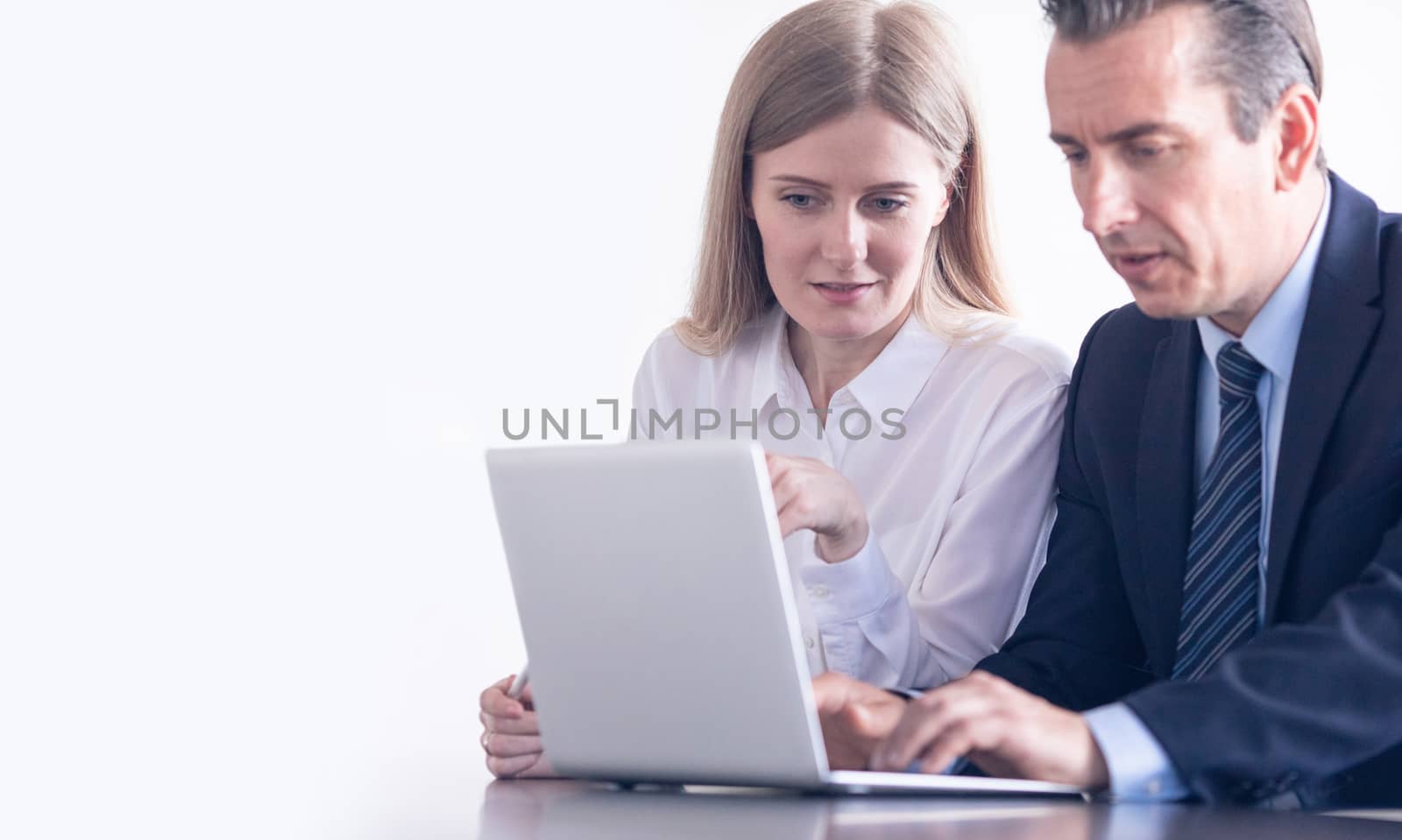 Business people working with laptop together in office copy space for text