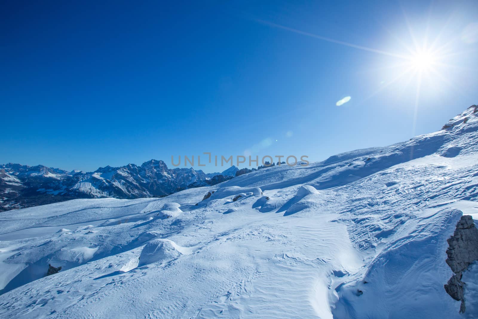 Dolomities Dolomiti Italy in wintertime beautiful alps winter mountains and ski slope Cortina d'Ampezzo Cinque torri mountain peaks famous landscape skiing resort area