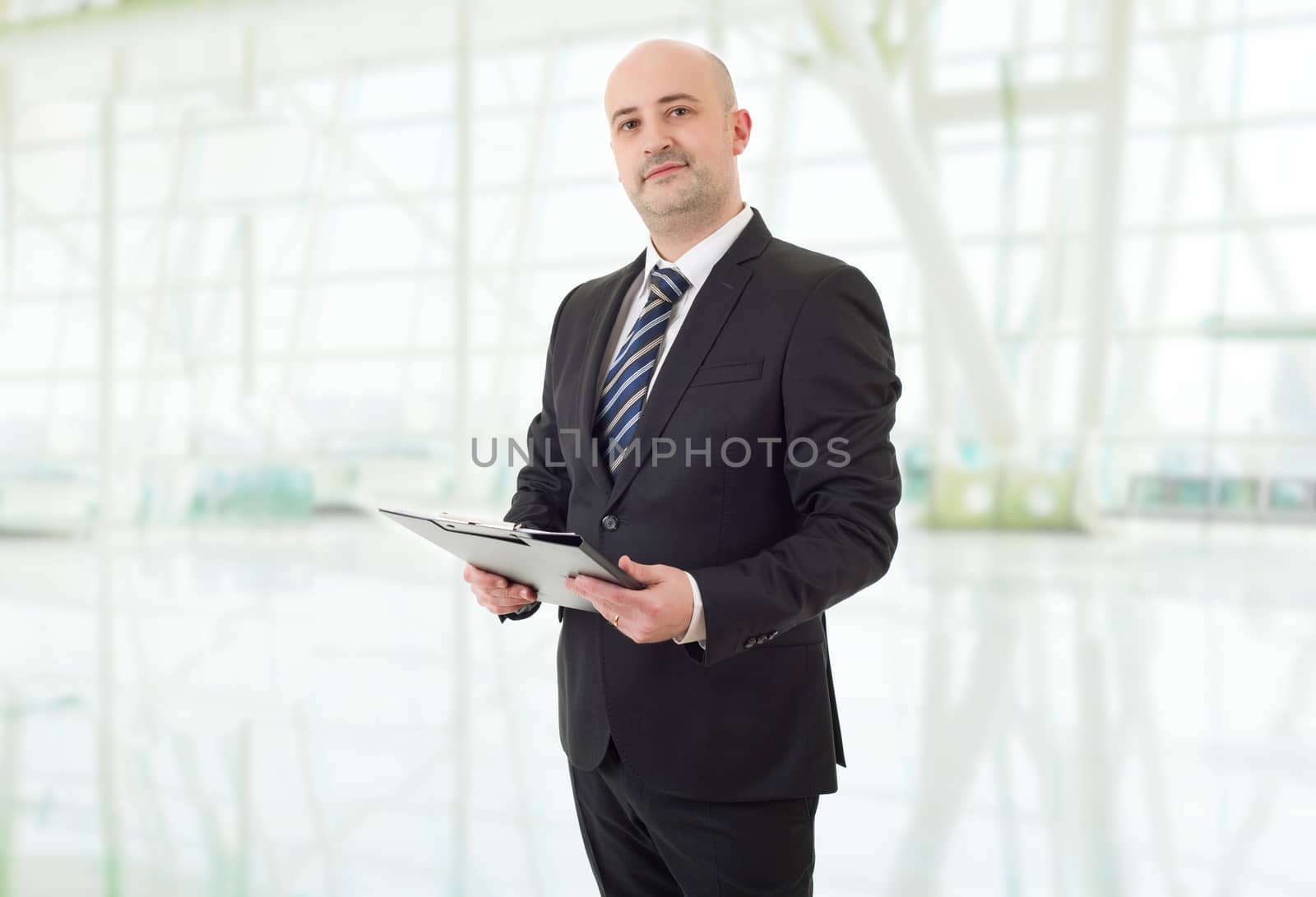 happy business man portrait at the office