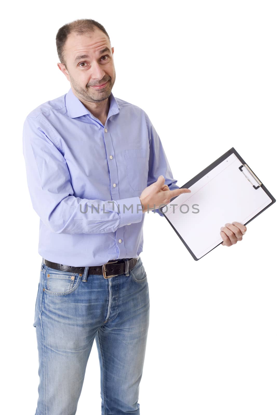 friendly young man pointing to a sheet and looking into the camera. isolated on white background