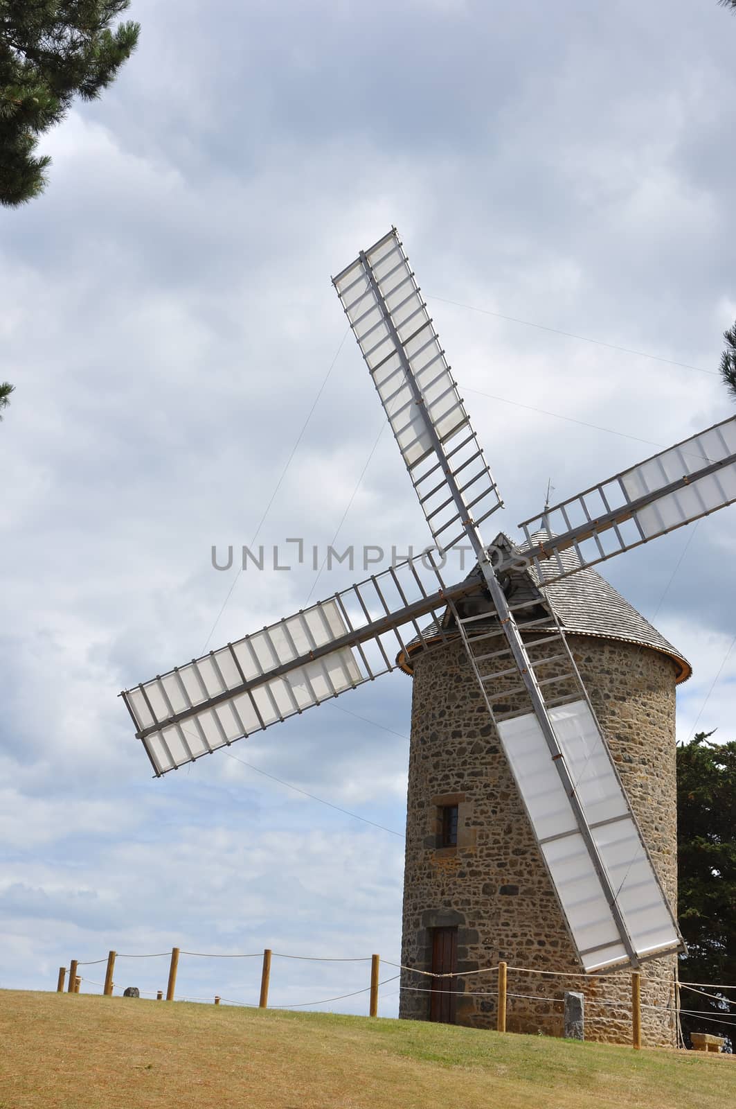 windmill in the countryside, France. miller's habitat for making flour