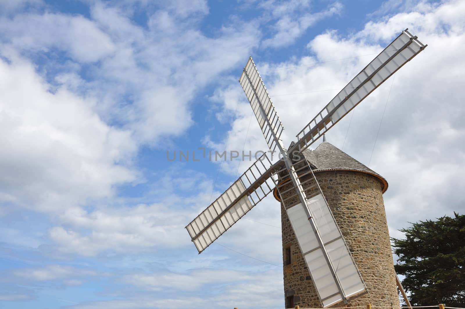 windmill in the countryside, France. miller's habitat for making flour