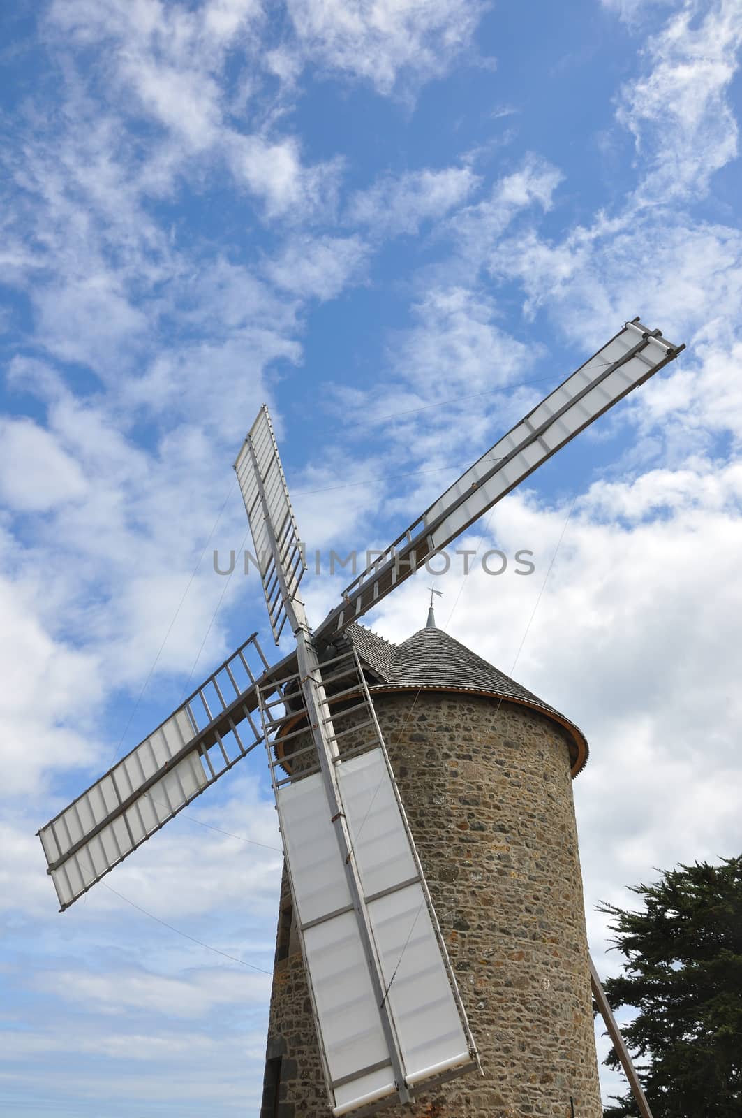 windmill in the countryside, France. miller's habitat for making flour