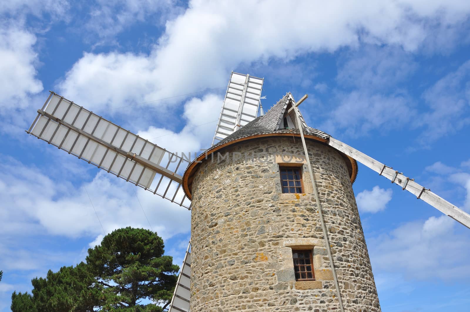 windmill in the countryside, France. miller's habitat for making flour