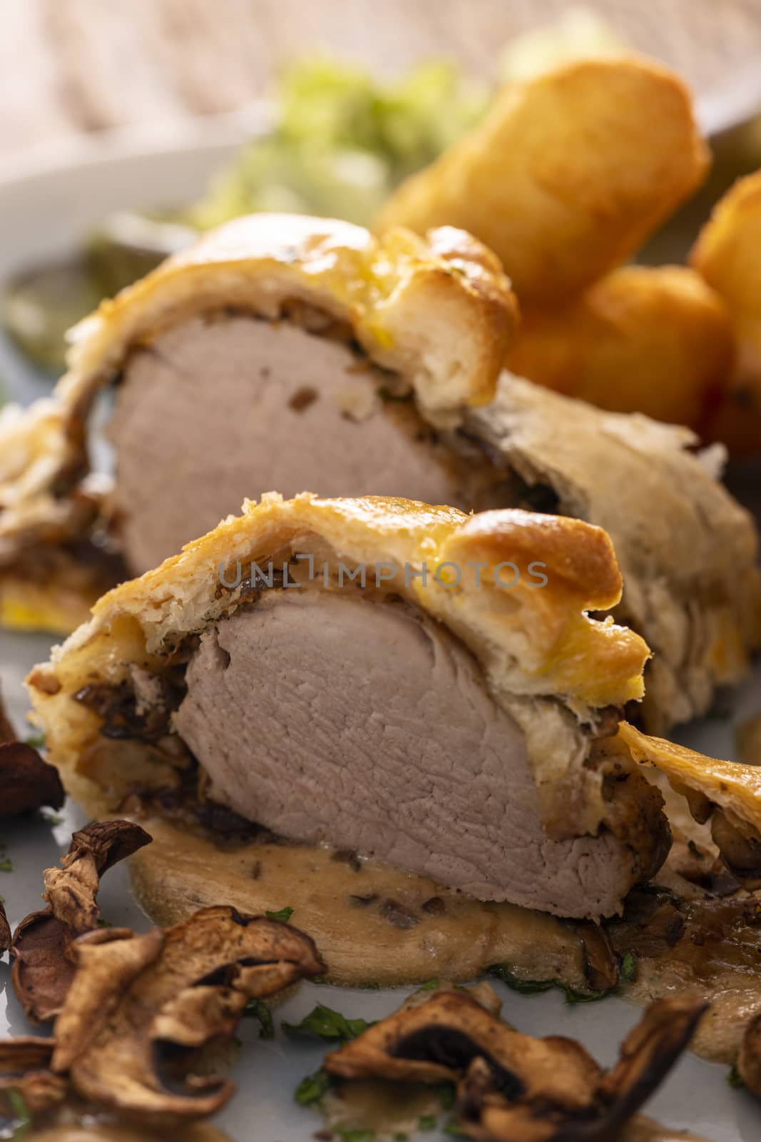 pork filet in puff pastry with croquettes