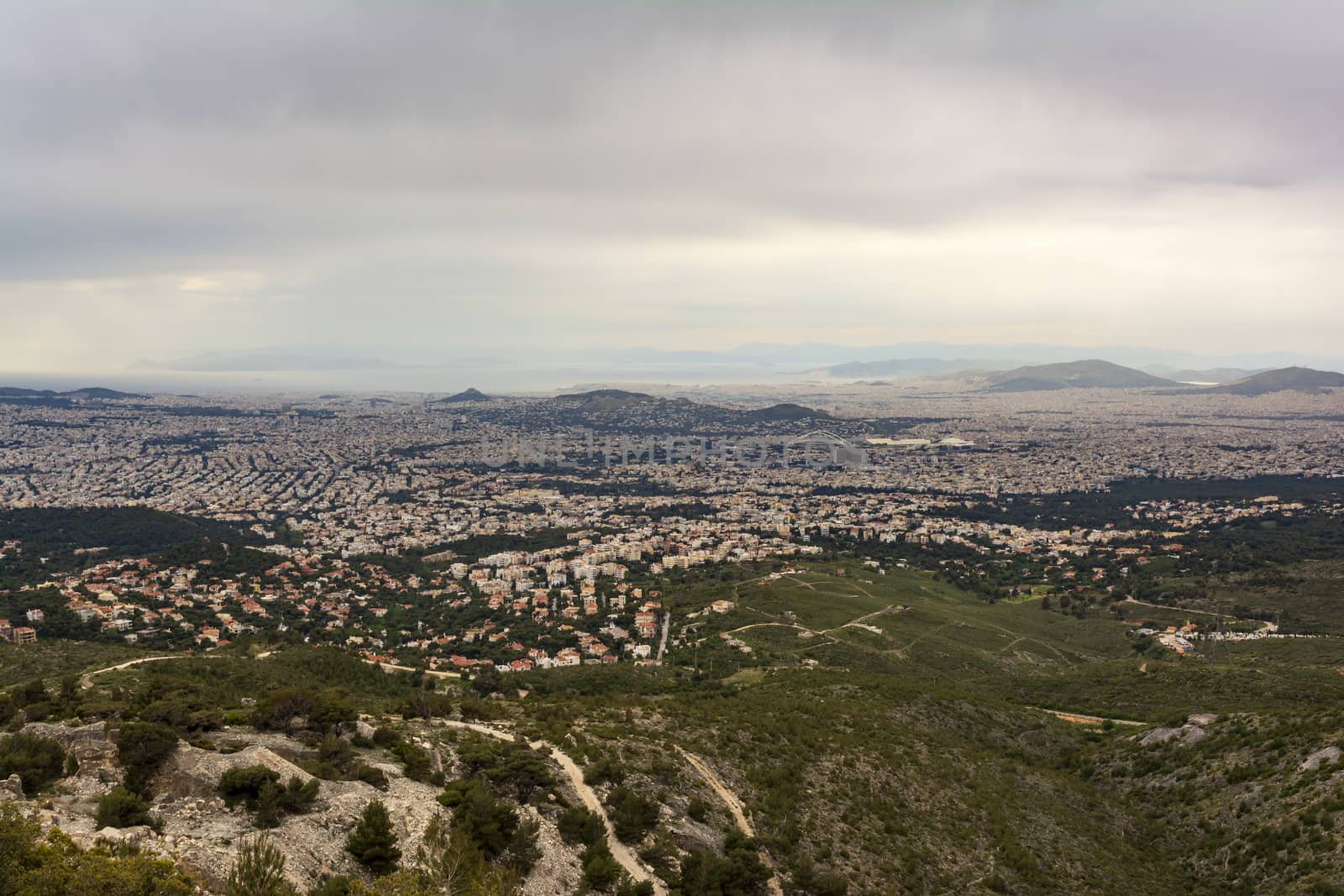 Panoramic view of cloudy Athens, taken shot from Penteli mountain by ankarb