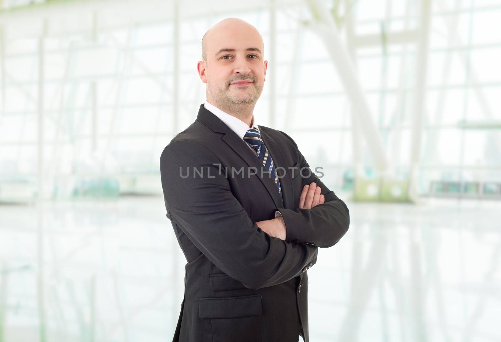 young business man portrait at the office