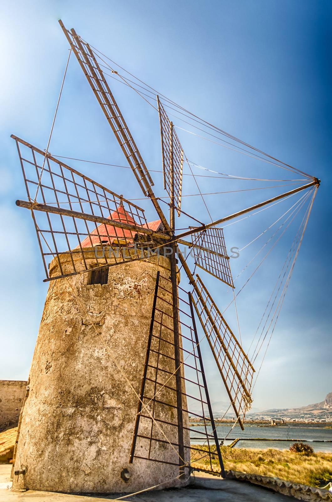 Old windmill for salt production, Sicily, Italy by marcorubino