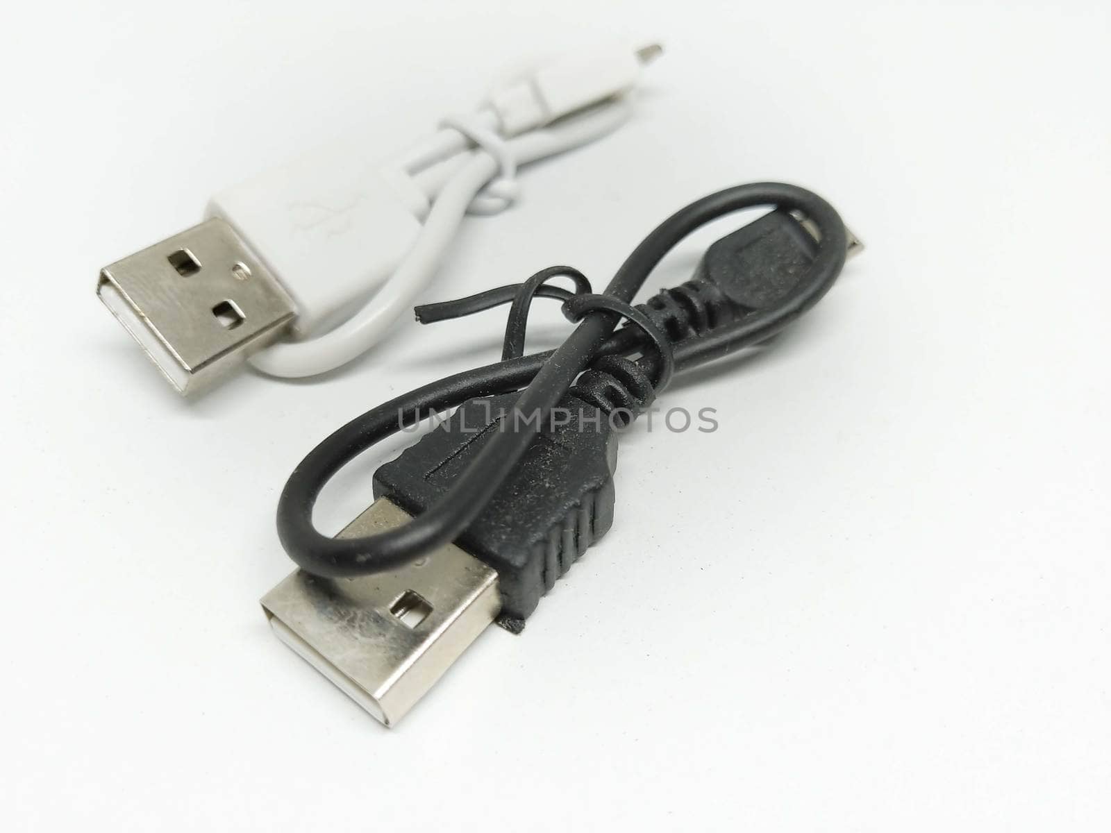 Usb cable resting on a white background