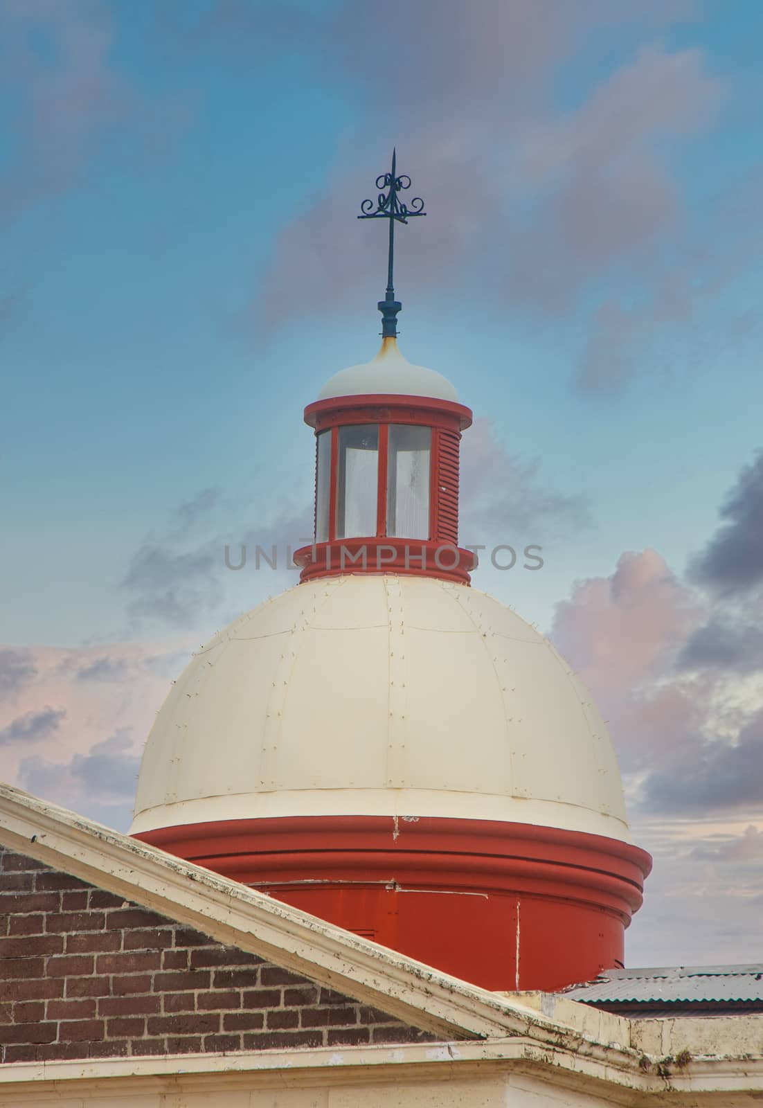 Red and Brown Dome on Building by dbvirago