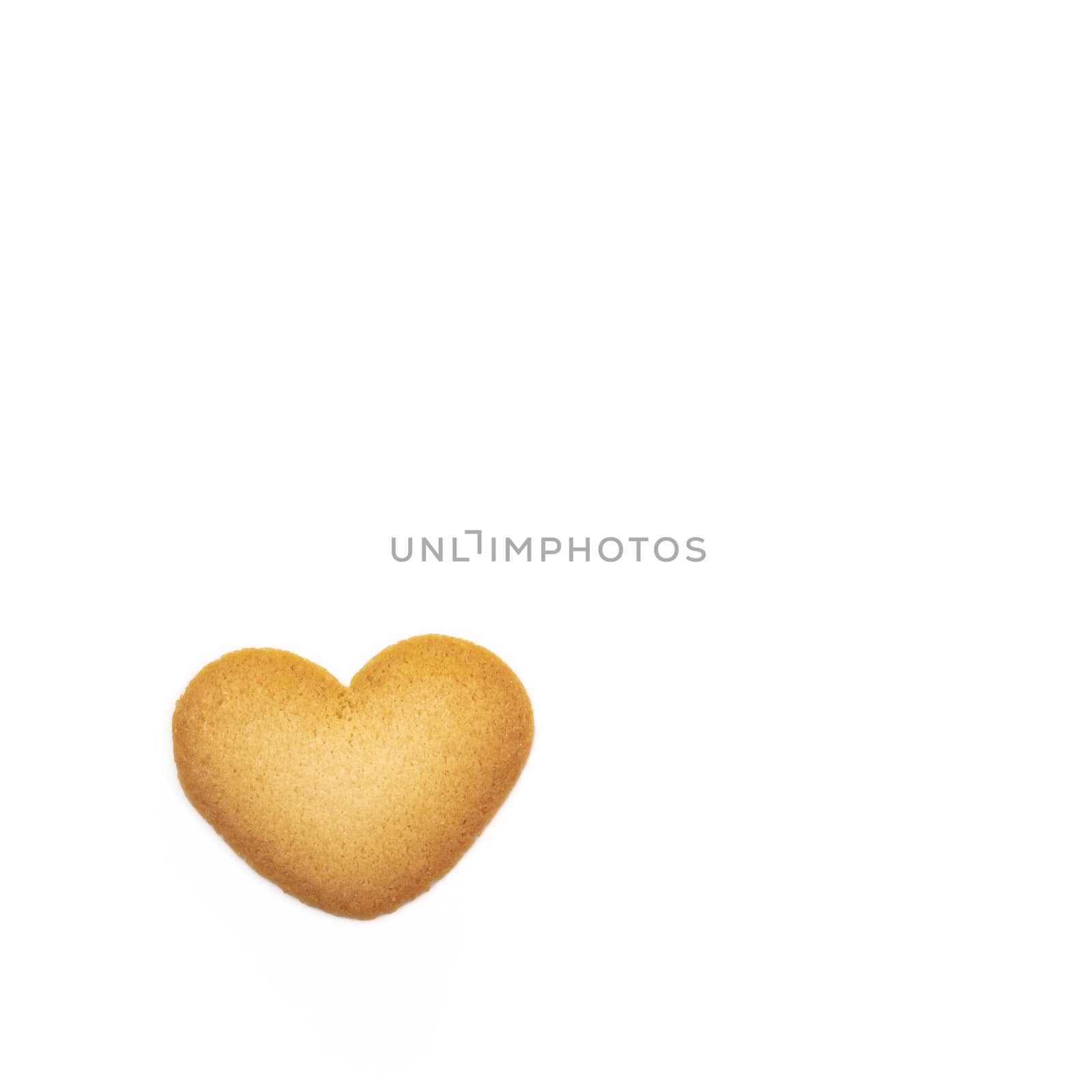 The close up of love heart shape cookie on white background for Valentine's day.