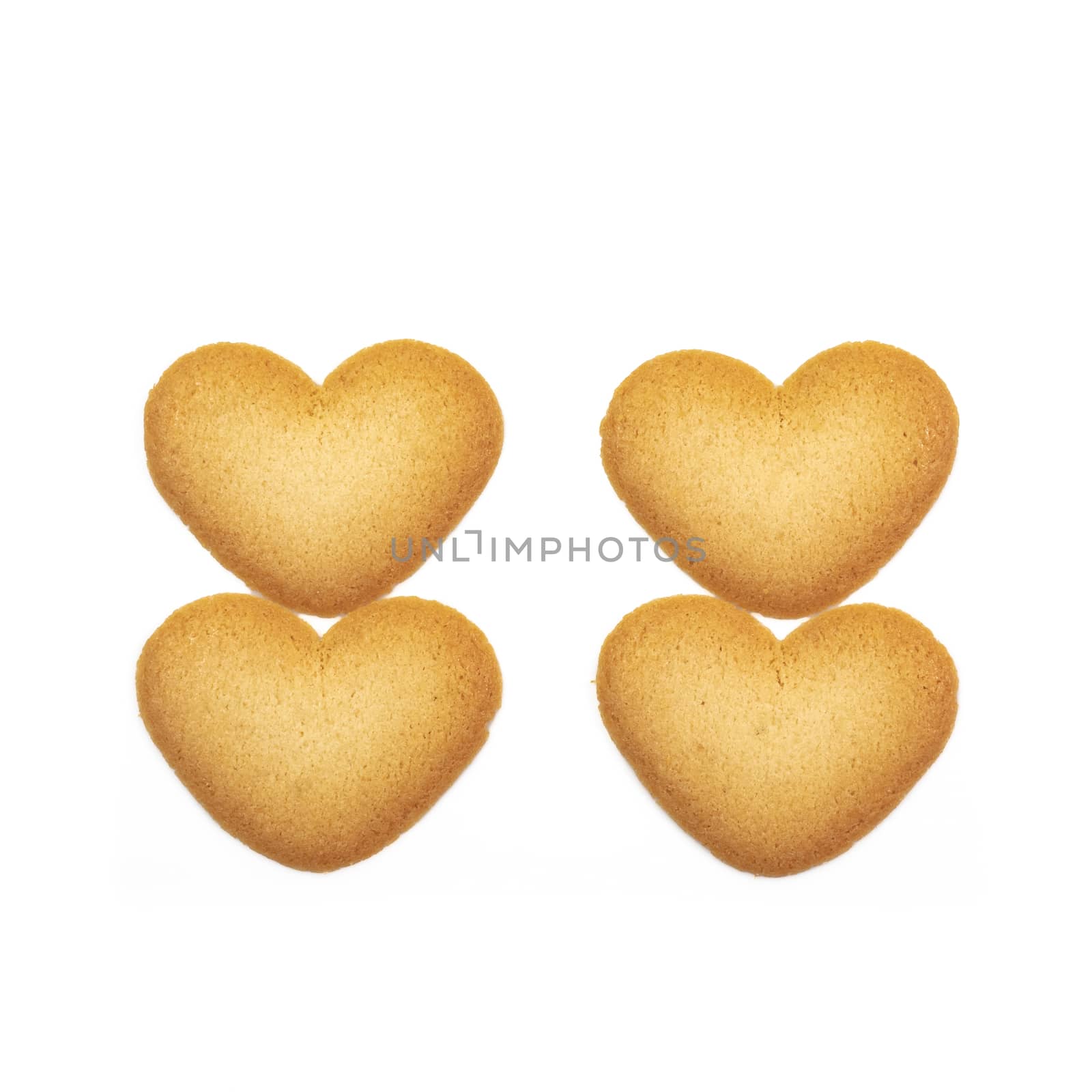 The close up of love heart shape cookie on white background for Valentine's day.
