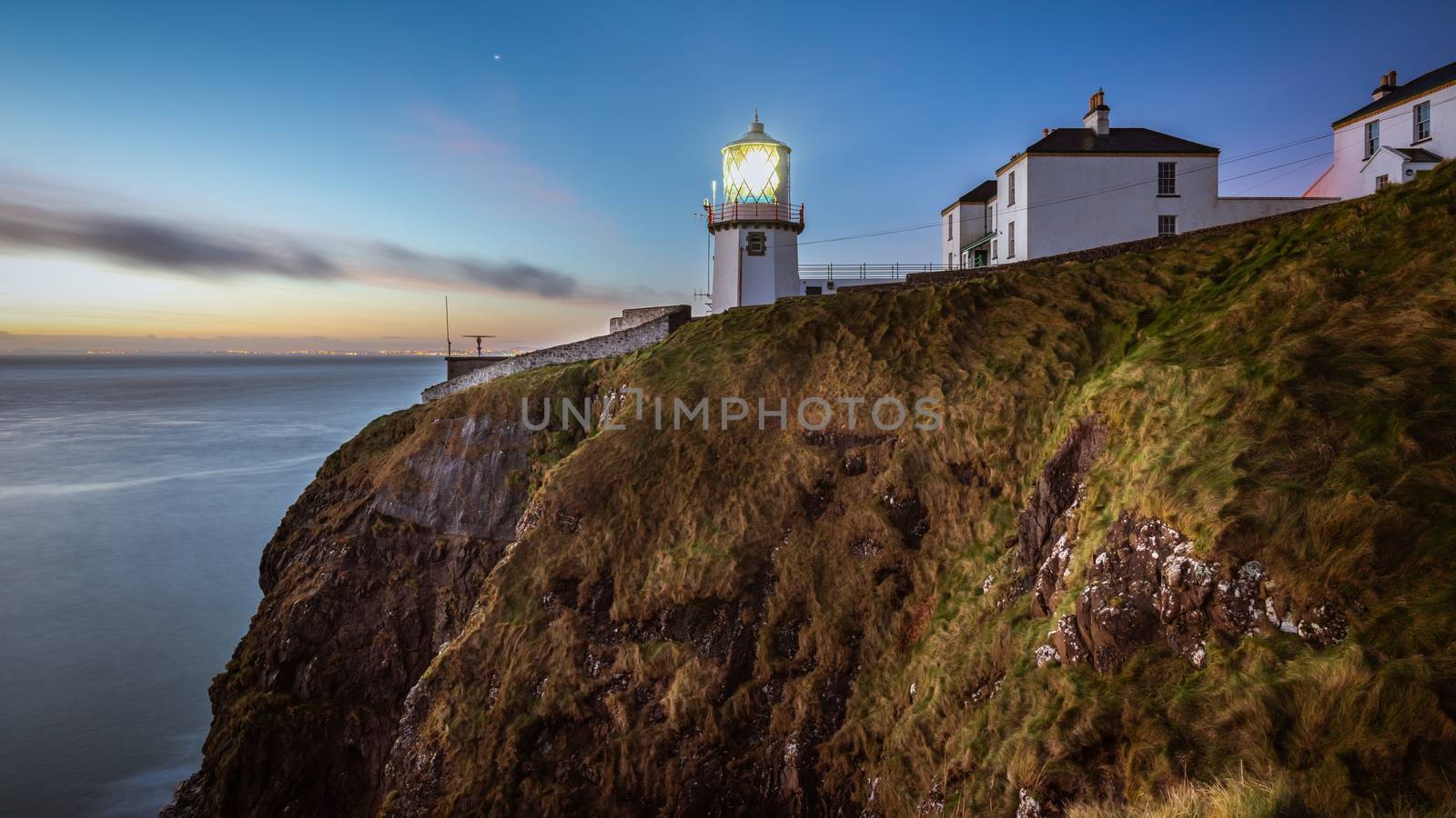 Dawn at Blackhead Lighthouse, County Antrim, Northern Ireland.