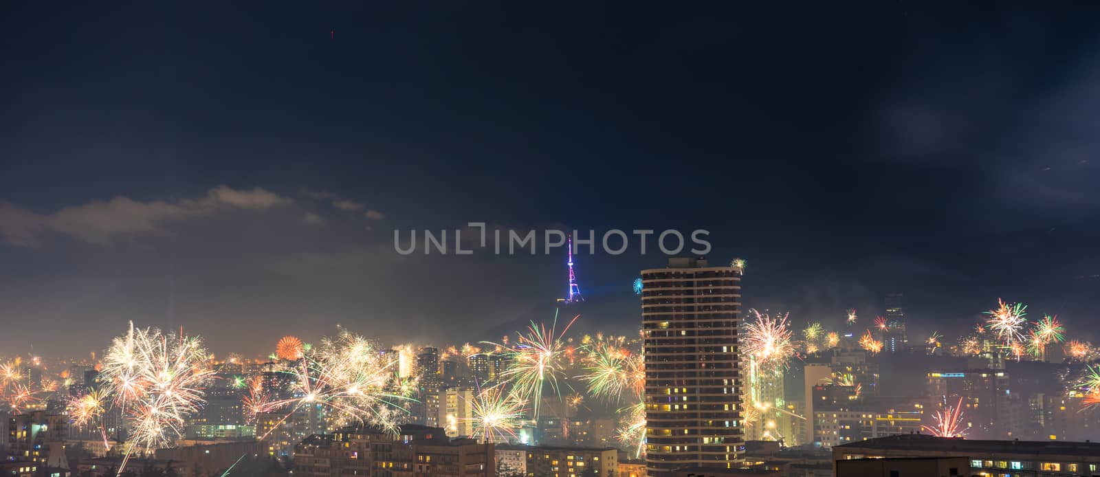 Georgia - Tbilisi. Meeting New 2020 year with fireworks over the central part of Tbilisi, capita city of Republic of Georgia in Caucasus region. 31.12.1019-01.01.2020