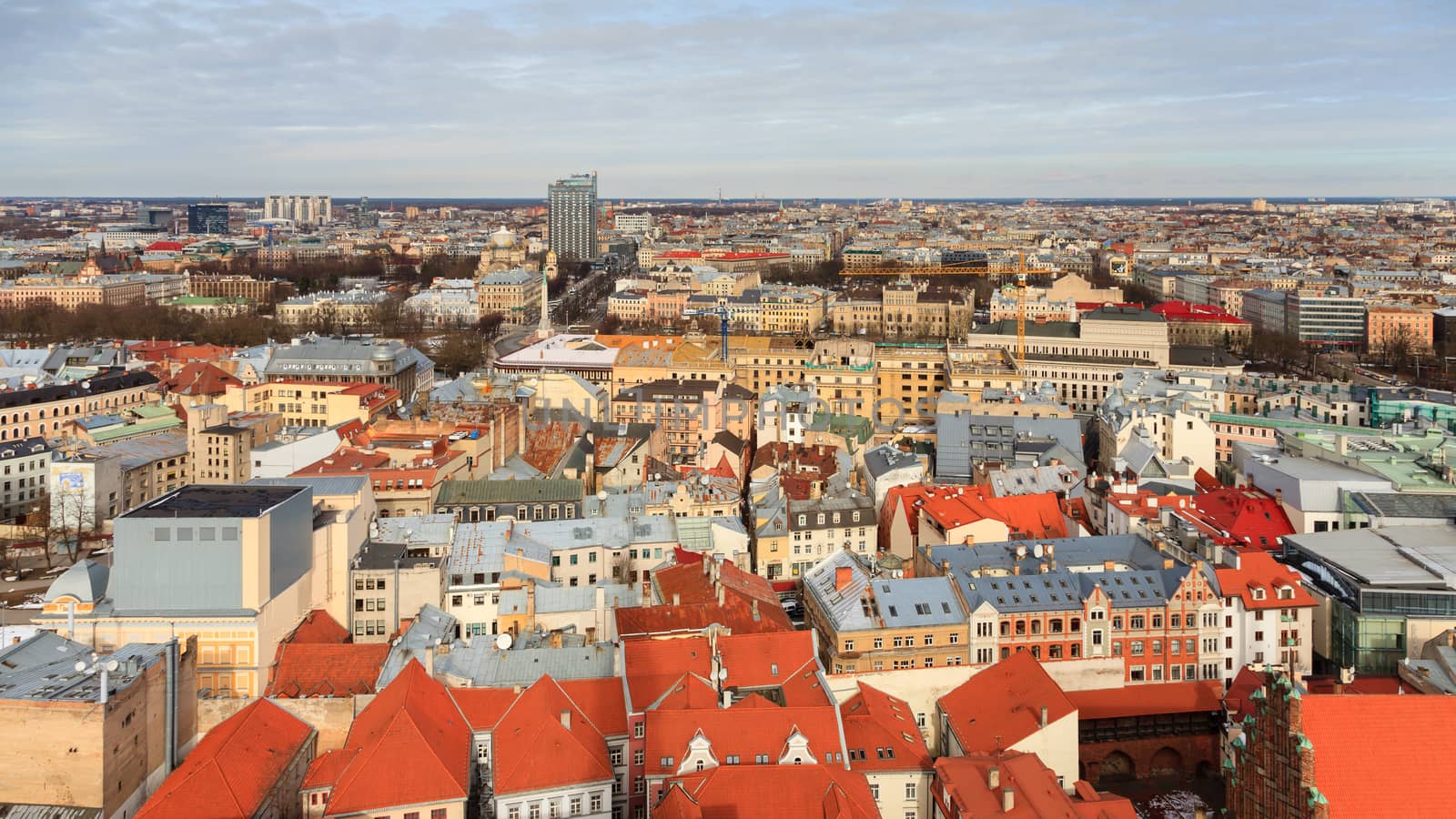 A panorama of the city of Riga capital of Latvia.  The Freedom Monument, National Opera and Nativity of Christ Cathedral can all be seen.