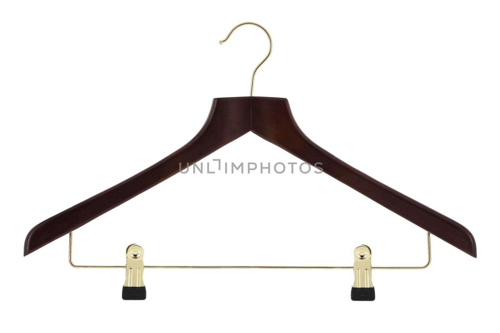 Dark ood clothes hanger with gold colored metal pants / skirt hanger isolated on a white background