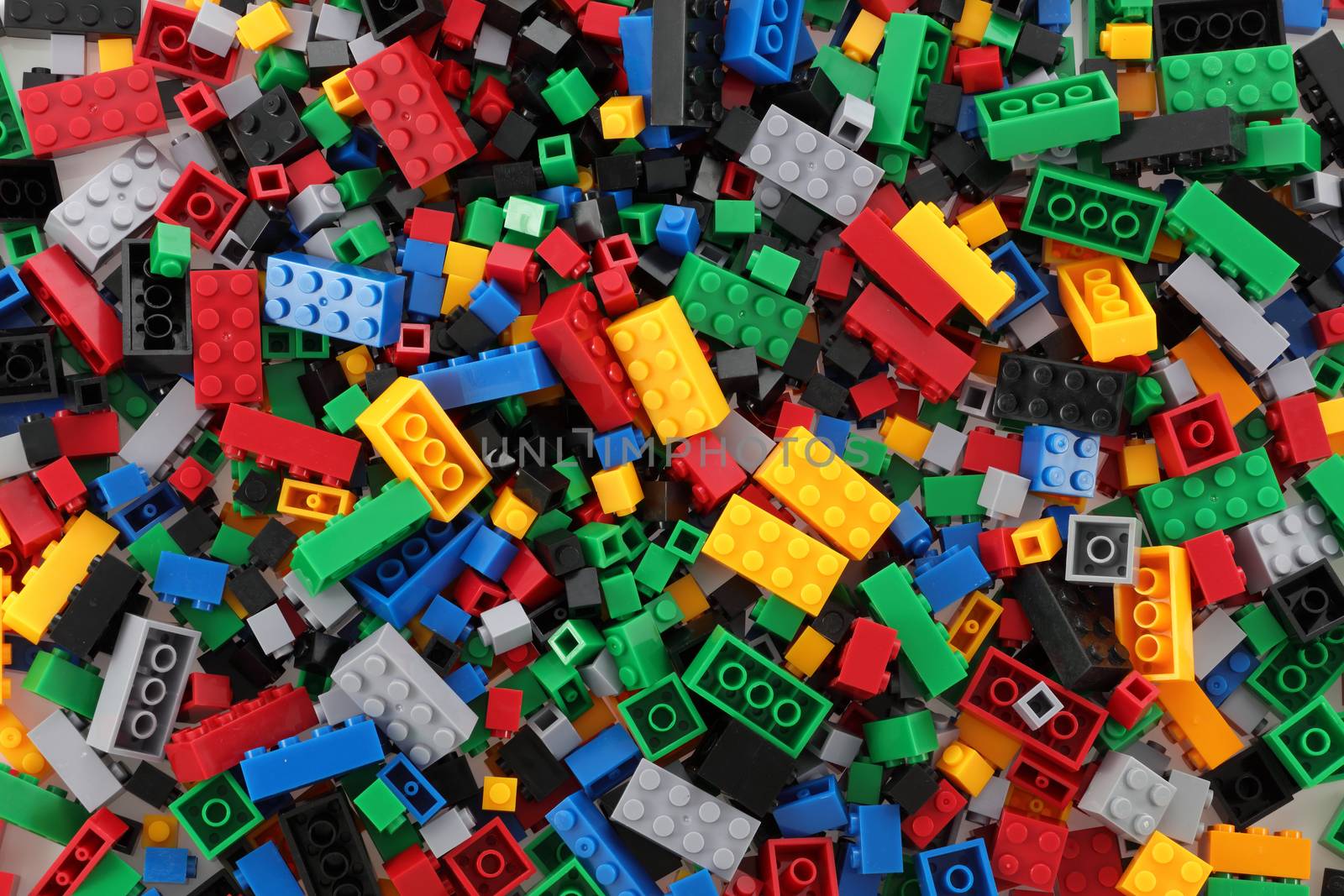 Pile of child's building blocks in multiple colours