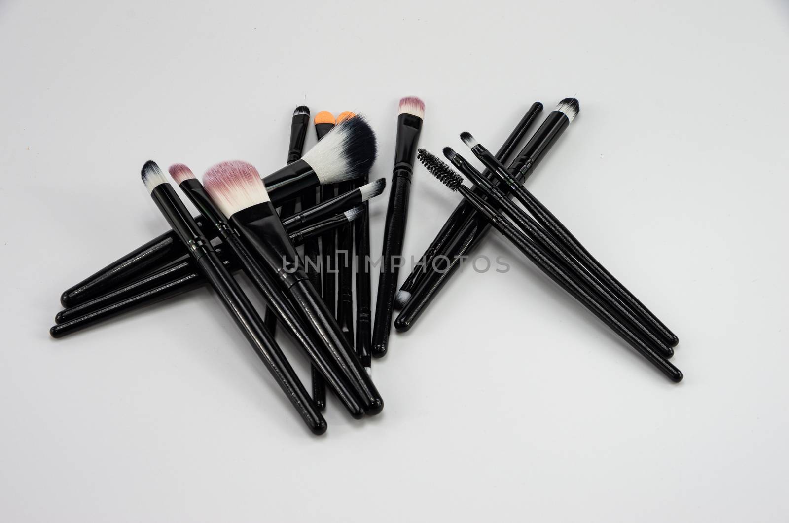 Various cosmetic brushes for make up eyebrows, eyes, face by Oskars