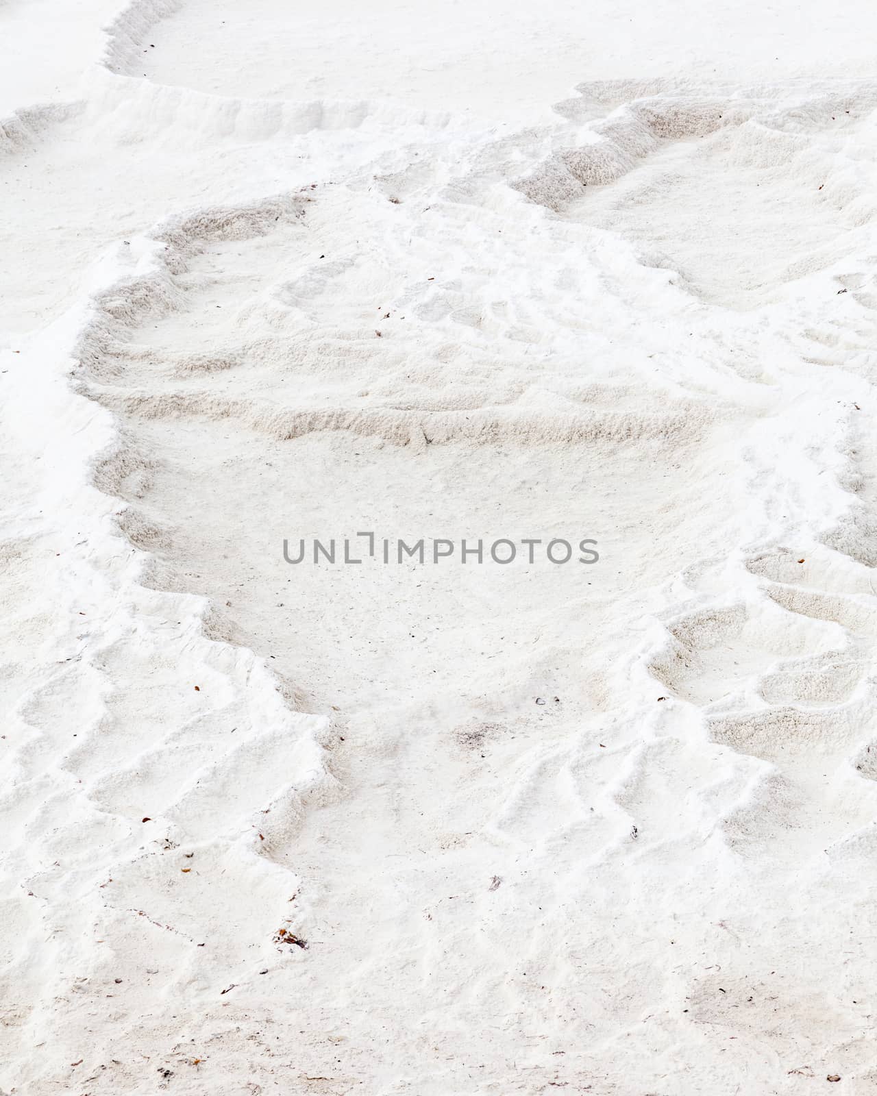 The view across a white travertine terrace in Pamukkale, southwestern Turkey.  The site is a UNESCO World Heritage Site.