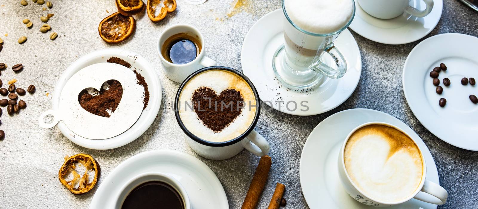 Coffee drink concept with variety of different coffee beverage on concrete background with copy space
