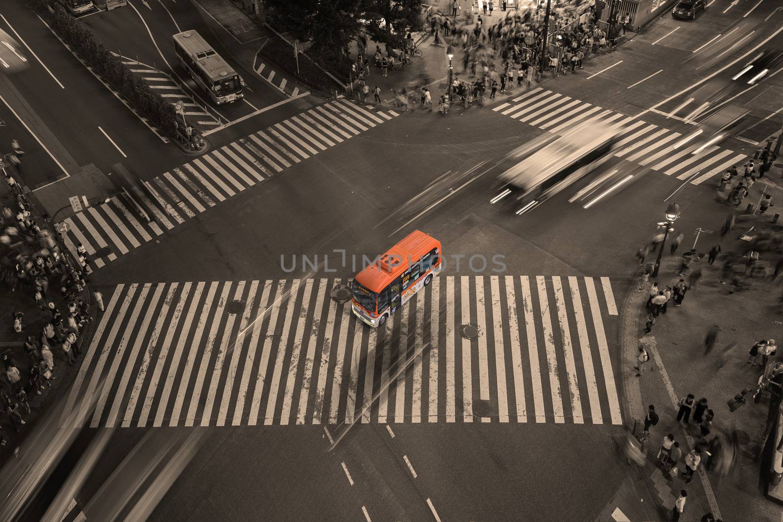 Aerial view of the Shibuya Crossing Intersection in front of Shibuya Station with Hachiko Community Bus stop in center.