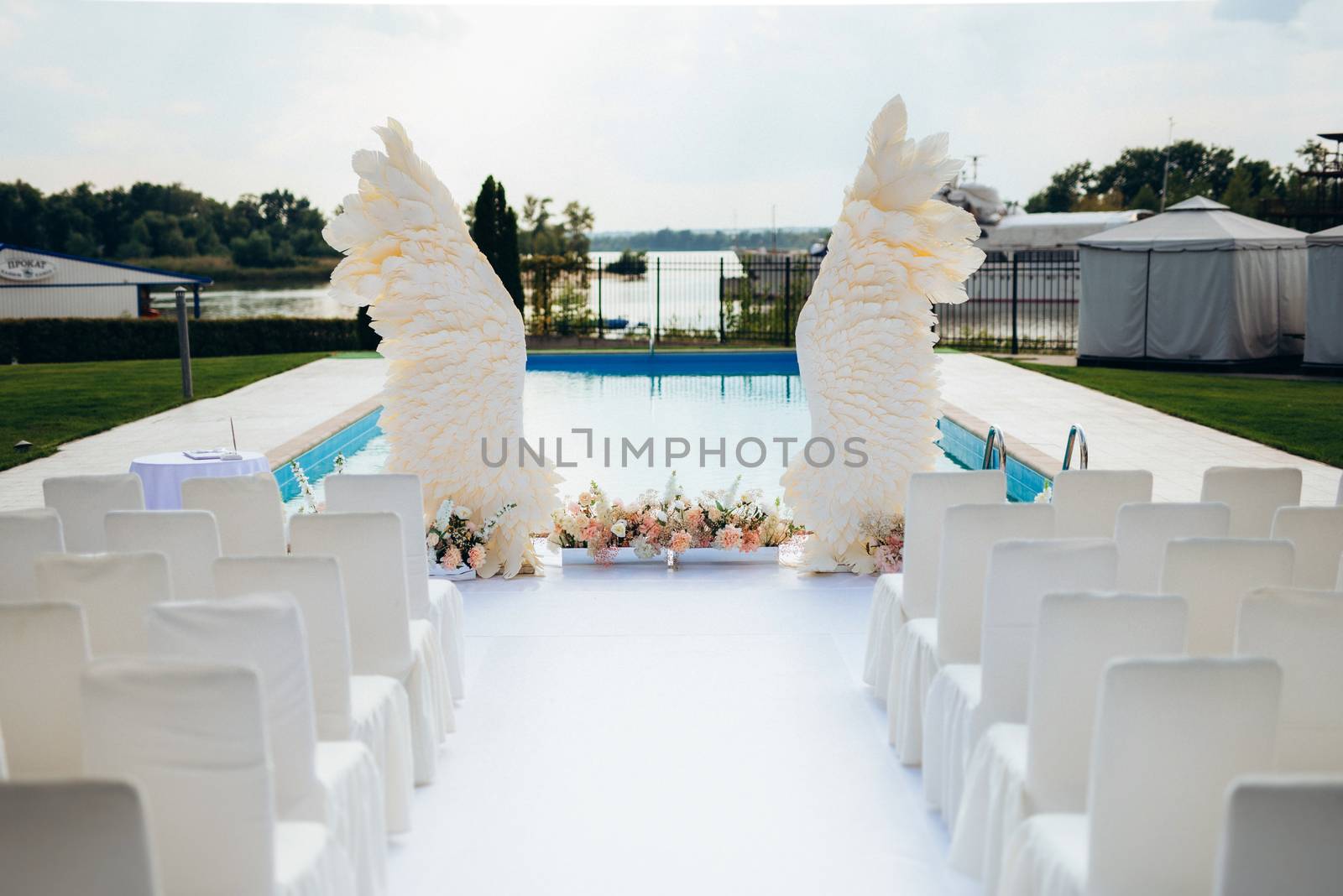 wedding ceremony area, arch chairs decor