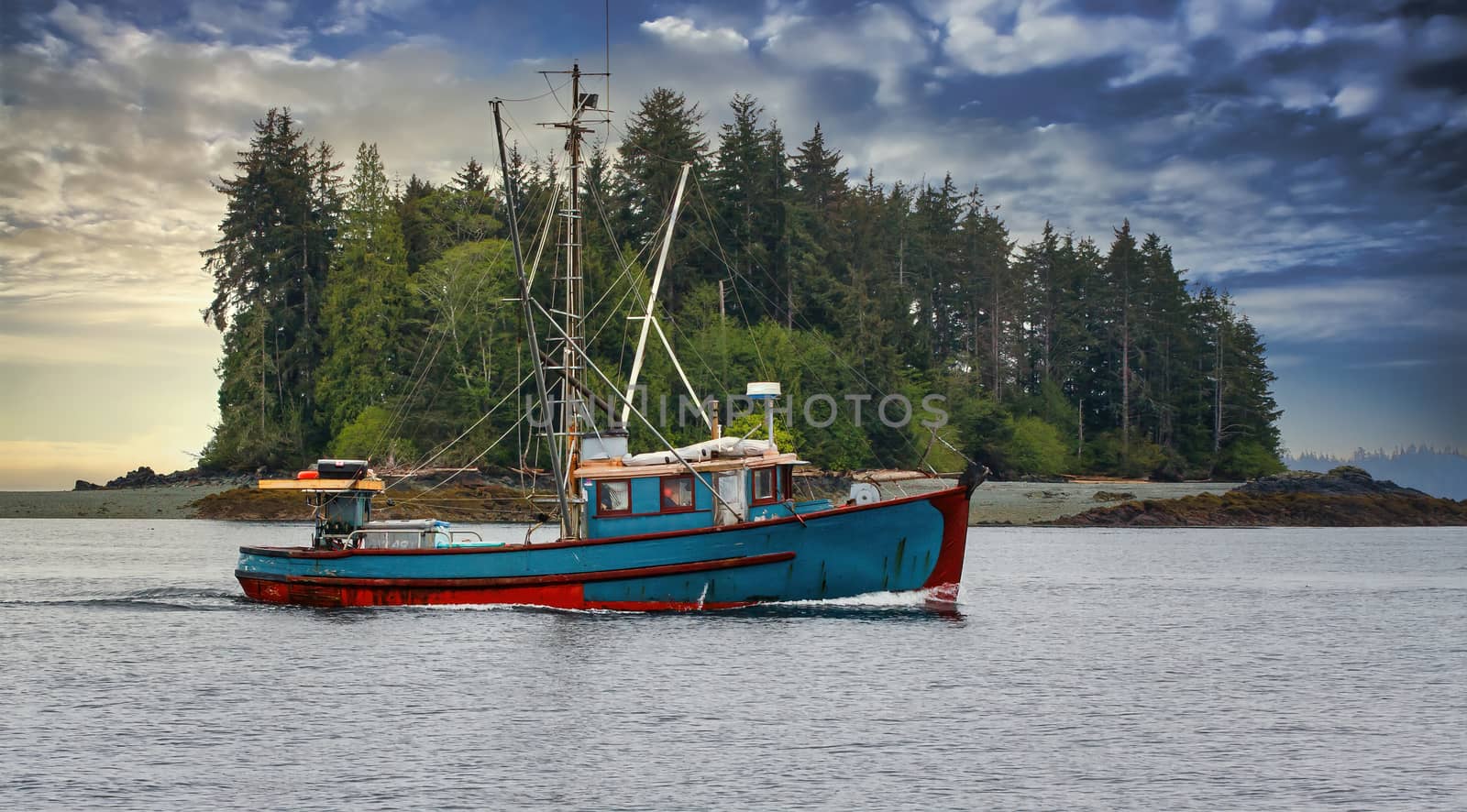 Blue Shrimp Boat Past Island by dbvirago