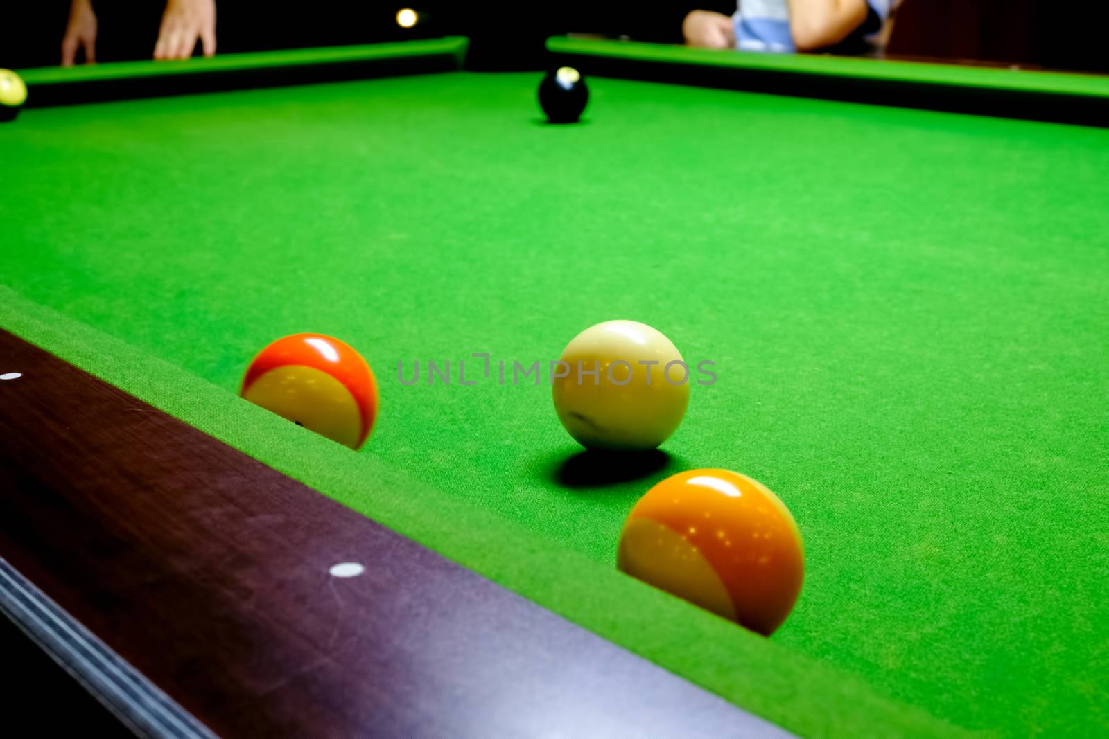 Green billiard table with balls. Close-up Balls on a billiard table.
