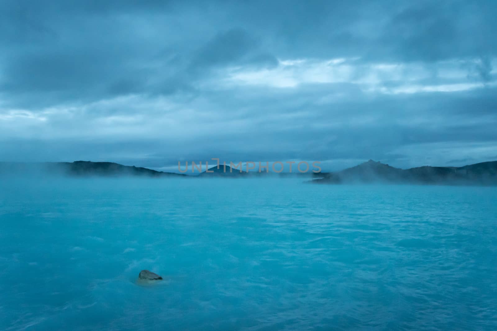 Blue Lake in Iceland geothermal hot lake turquoise water by MXW_Stock
