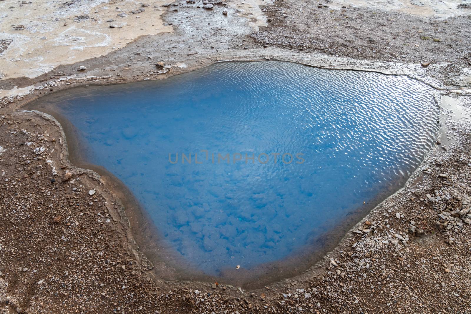 Geysir Golden Circle in Iceland milky water in thermal spring pool called Blesi by MXW_Stock