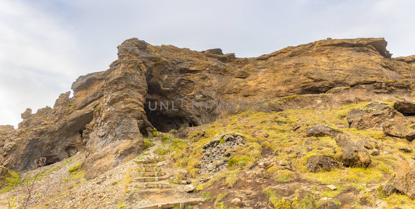 Glymur waterfall in Iceland stairs to cave on the way to the fall by MXW_Stock