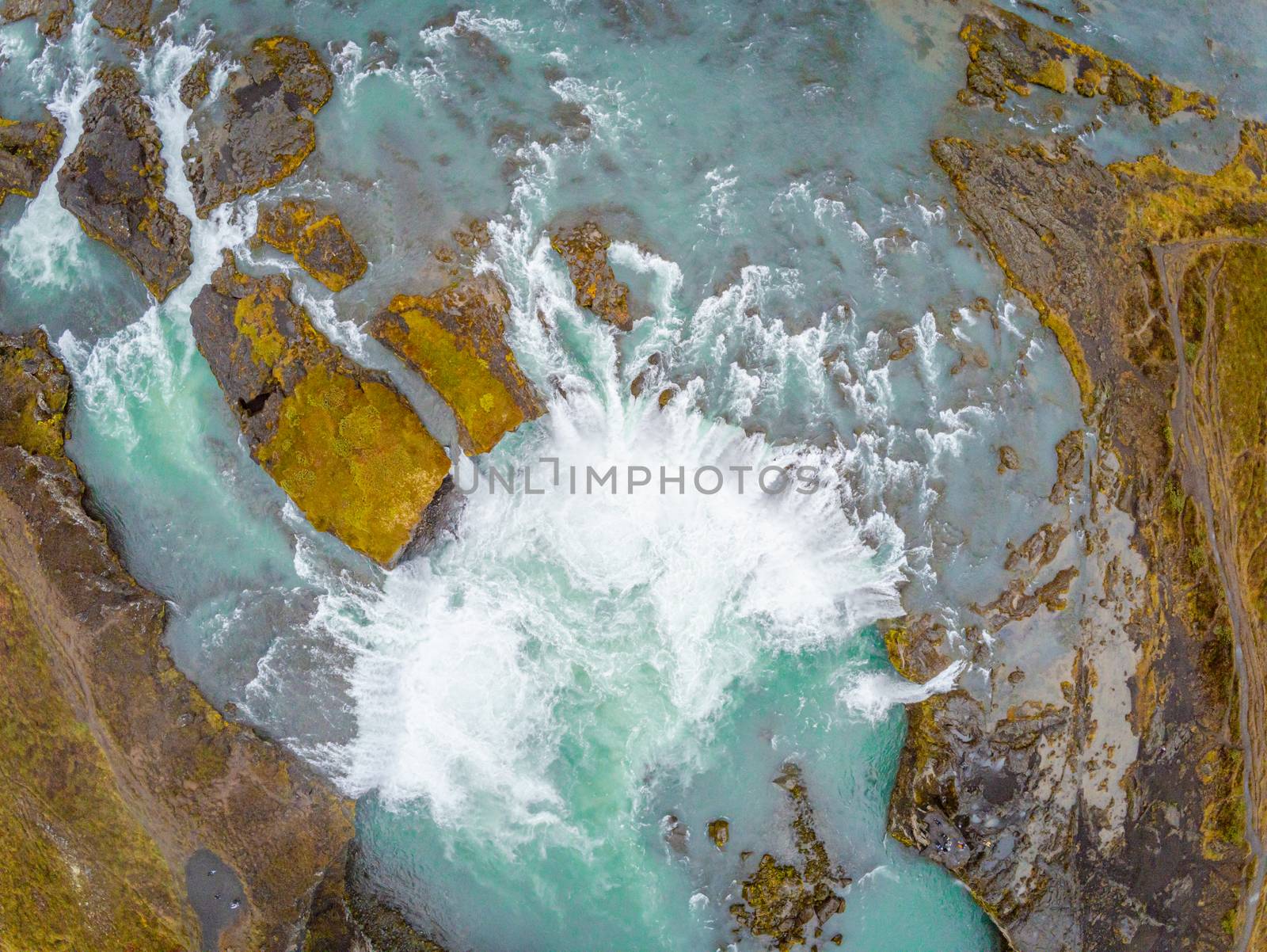 Godafoss waterfall in Iceland aerial photo of plunge pool with turquoise water