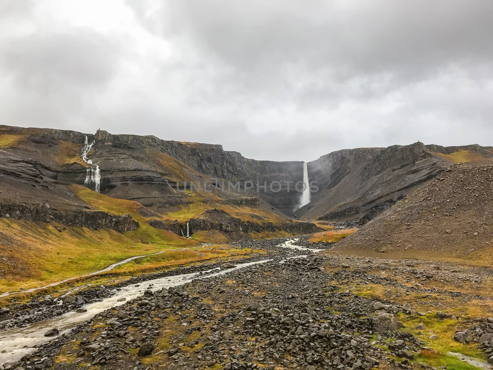 Litlanesfoss and Hengifoss waterfall in east Iceland during heavy rainfall by MXW_Stock