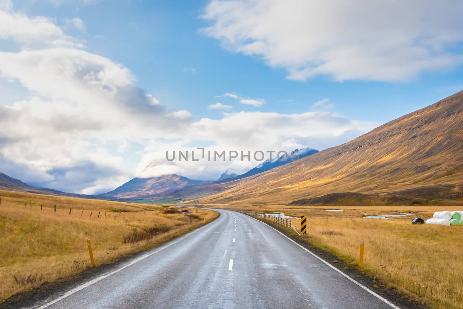 Northern Iceland empty road leading though scenic fall landscape