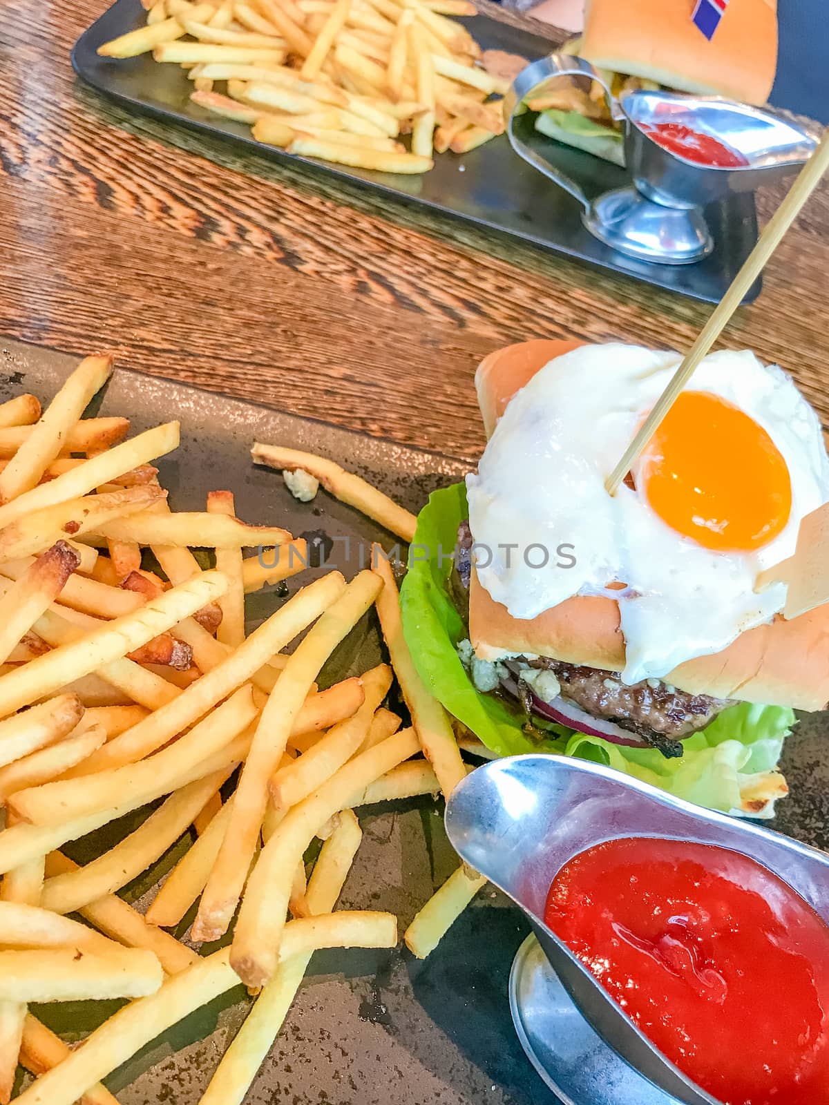 Reykjavik in Iceland food found in Reykjavik delicious burger with fries by MXW_Stock