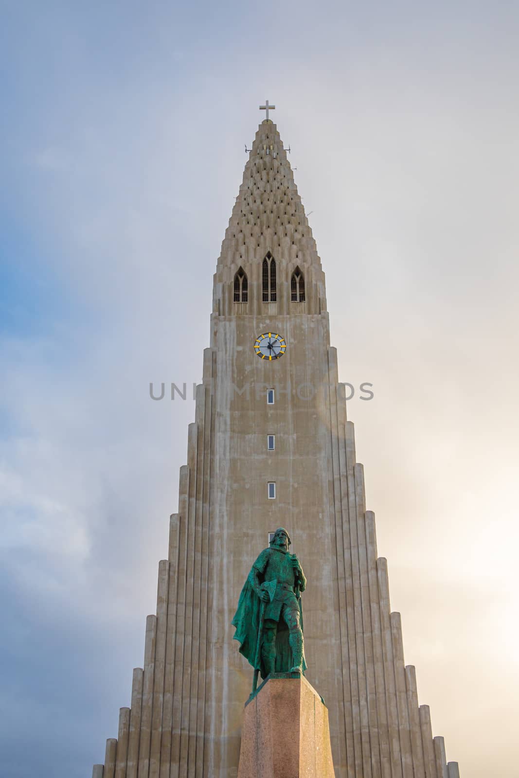 Reykjavik in Iceland Hilgrimskirkja Hilgims church during beautiful sunny day behind Lerik Eriksson Monument