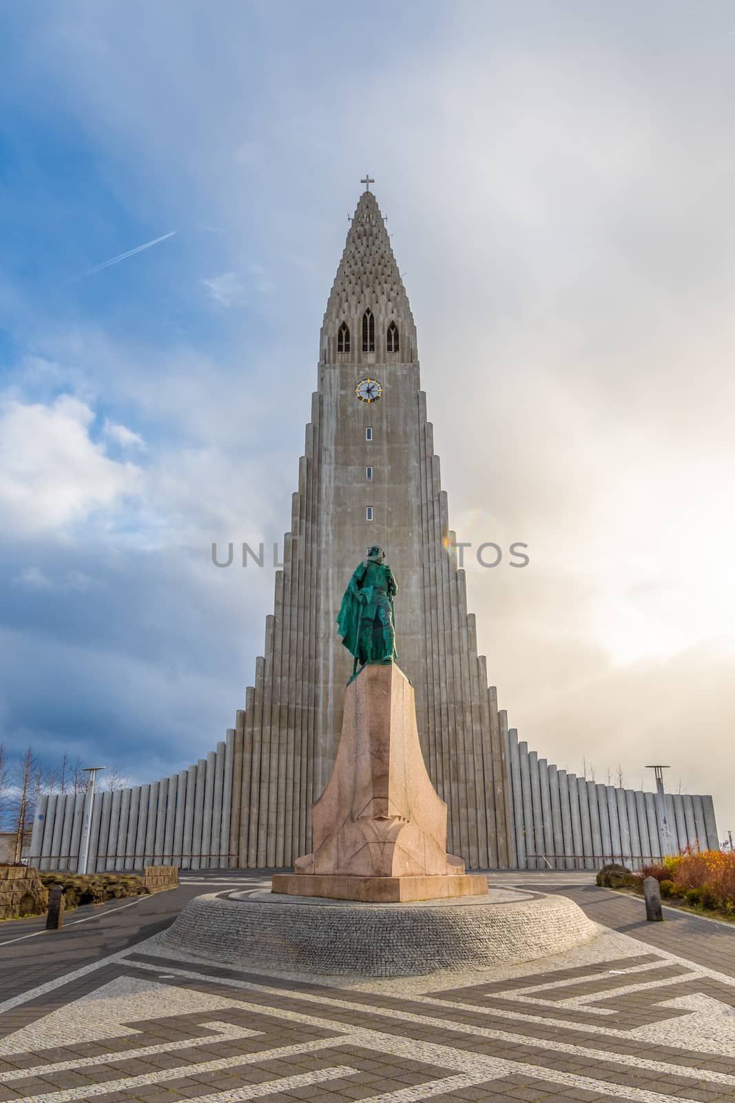Reykjavik in Iceland Hilgrimskirkja Hilgims church during beautiful sunny day by MXW_Stock