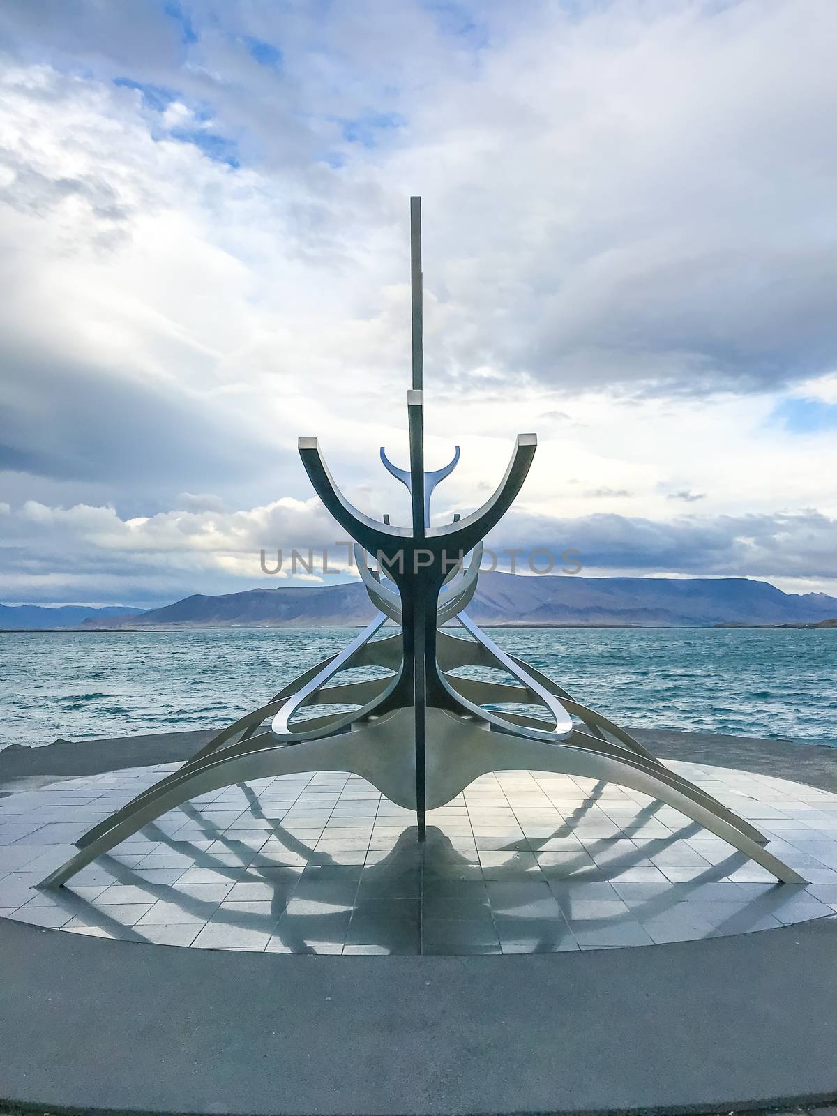 Reykjavik in Iceland Sun Voyager sculpture metal boat viking symbol by MXW_Stock