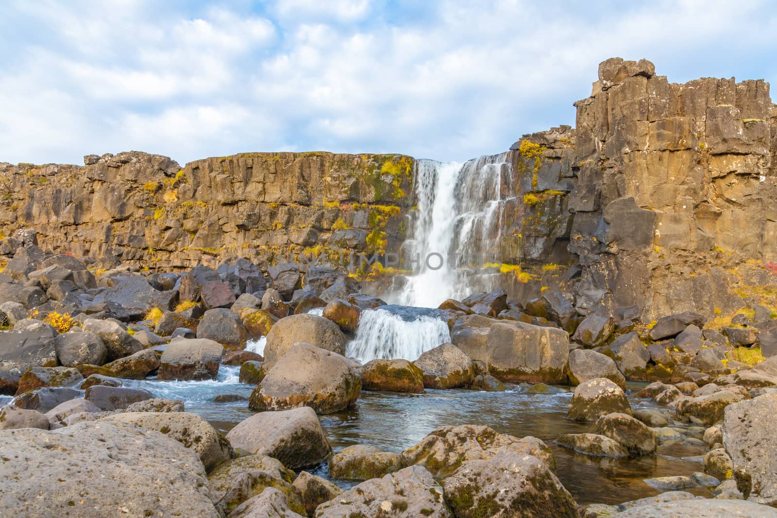 Thingvellir National Park in Iceland Oexararfoss waterfall by MXW_Stock