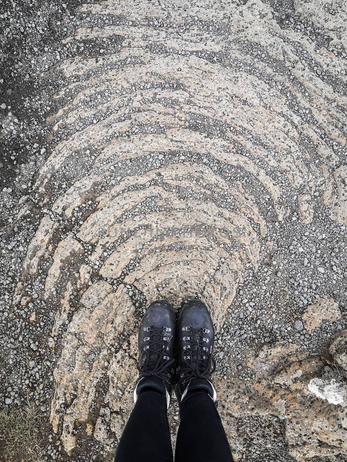 Thingvellir National Park in Iceland standing on solidified magma flow structures by MXW_Stock