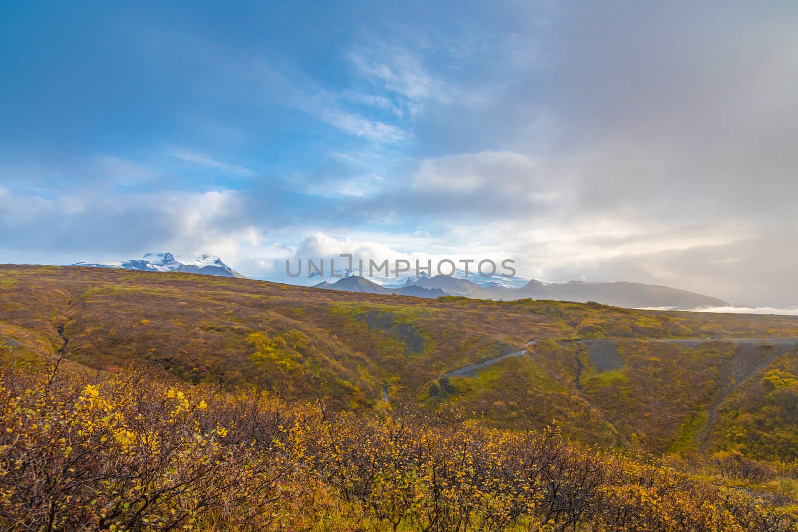 Vatnajoekull glacier colorful autumn landscape in front of icy mountain tops by MXW_Stock