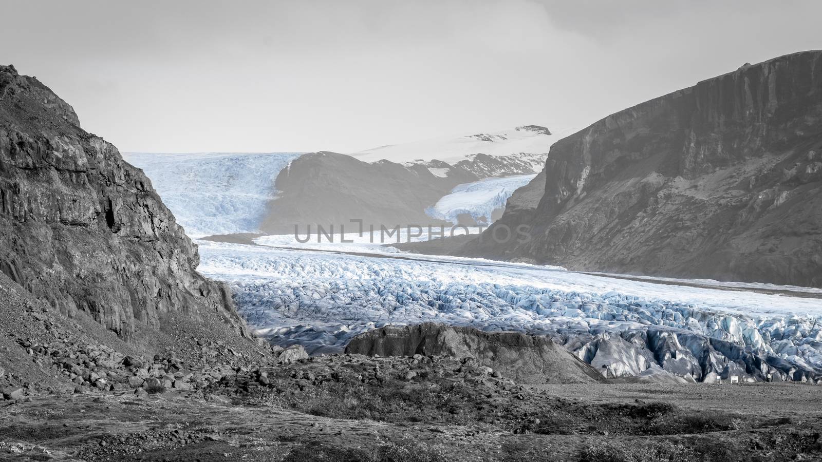 Vatnajoekull glacier in Iceland eternal ice fine art print in black and white with blue accent color