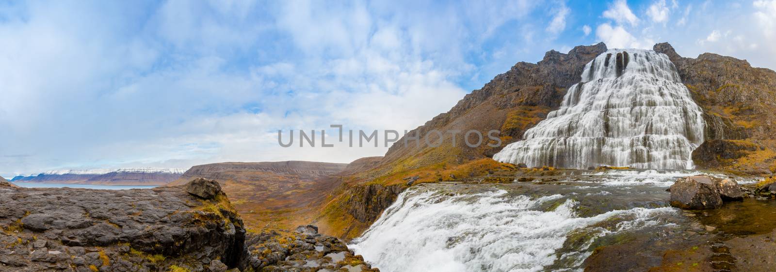 Westfjords of Iceland Dynjandi waterfall panorama of fall during sunny weather by MXW_Stock