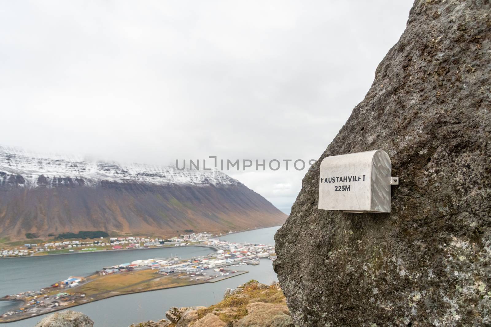 Westfjords of Iceland Naustahvilft The Troll Seat postbox mounted at top by MXW_Stock