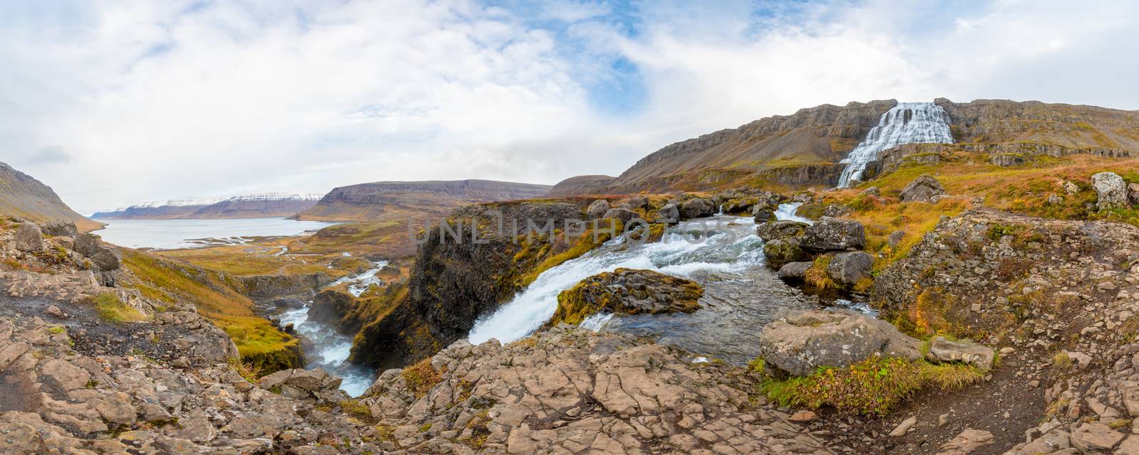 Westfjords of Iceland Göngummanafoss and Dynjandi waterfall panorama of fall and the snow covered fjord by MXW_Stock