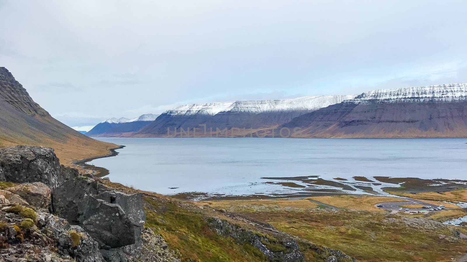 Westfjords of Iceland view into fjord mountain tops already covered in snow during autumn close to Dynjandi
