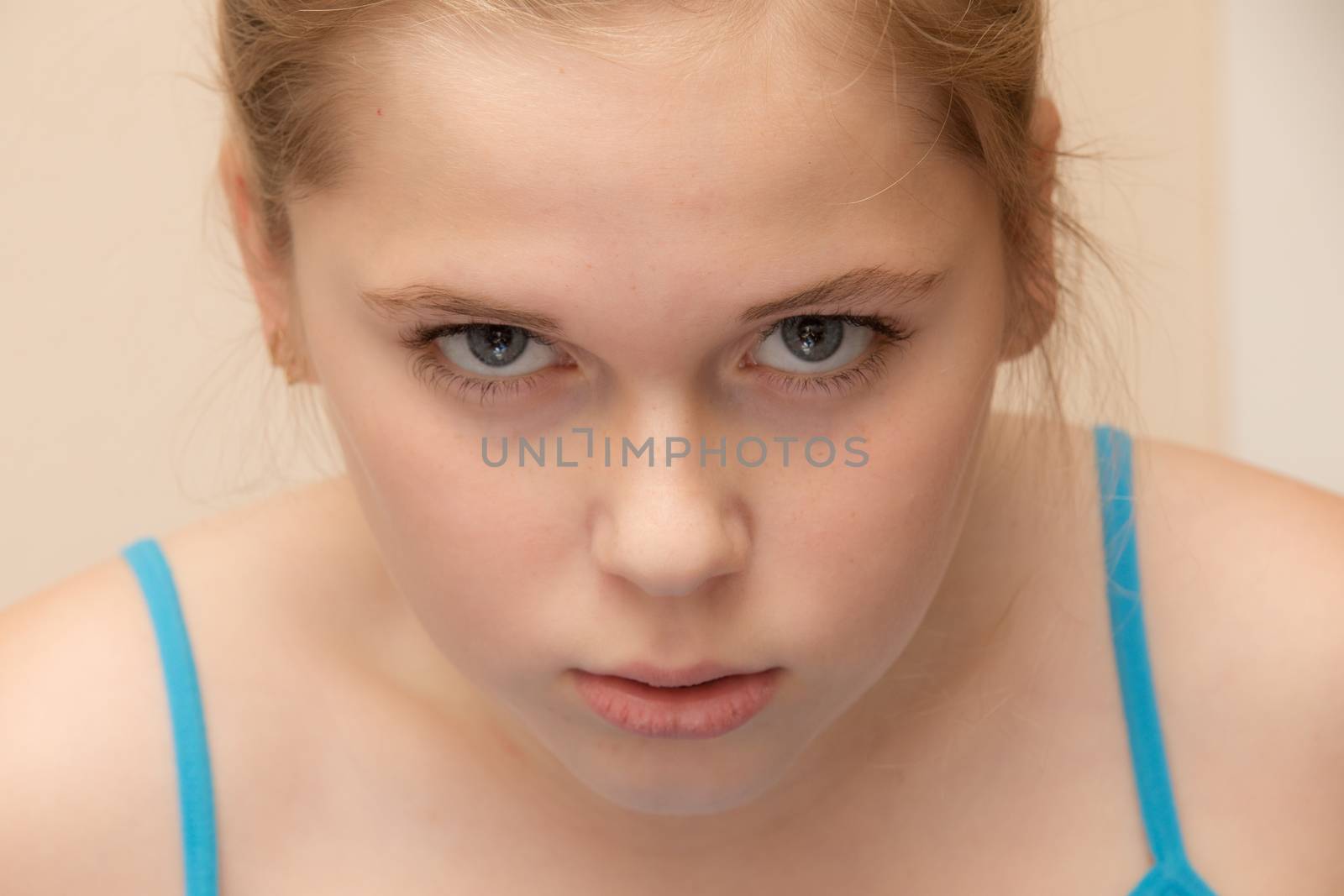 Preteen with an angry look upon her face