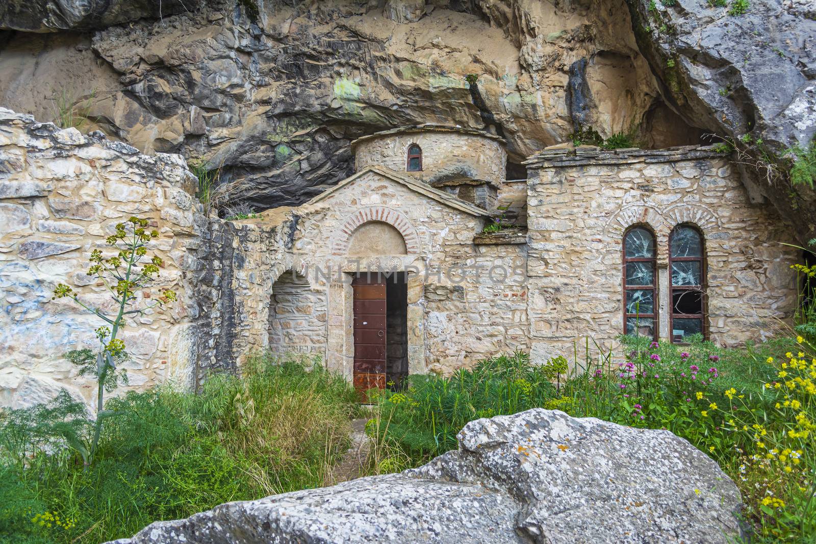 Orthodox monastery enclosed by Davelis cave in Penteli, a mountain to the north of Athens, Greece.